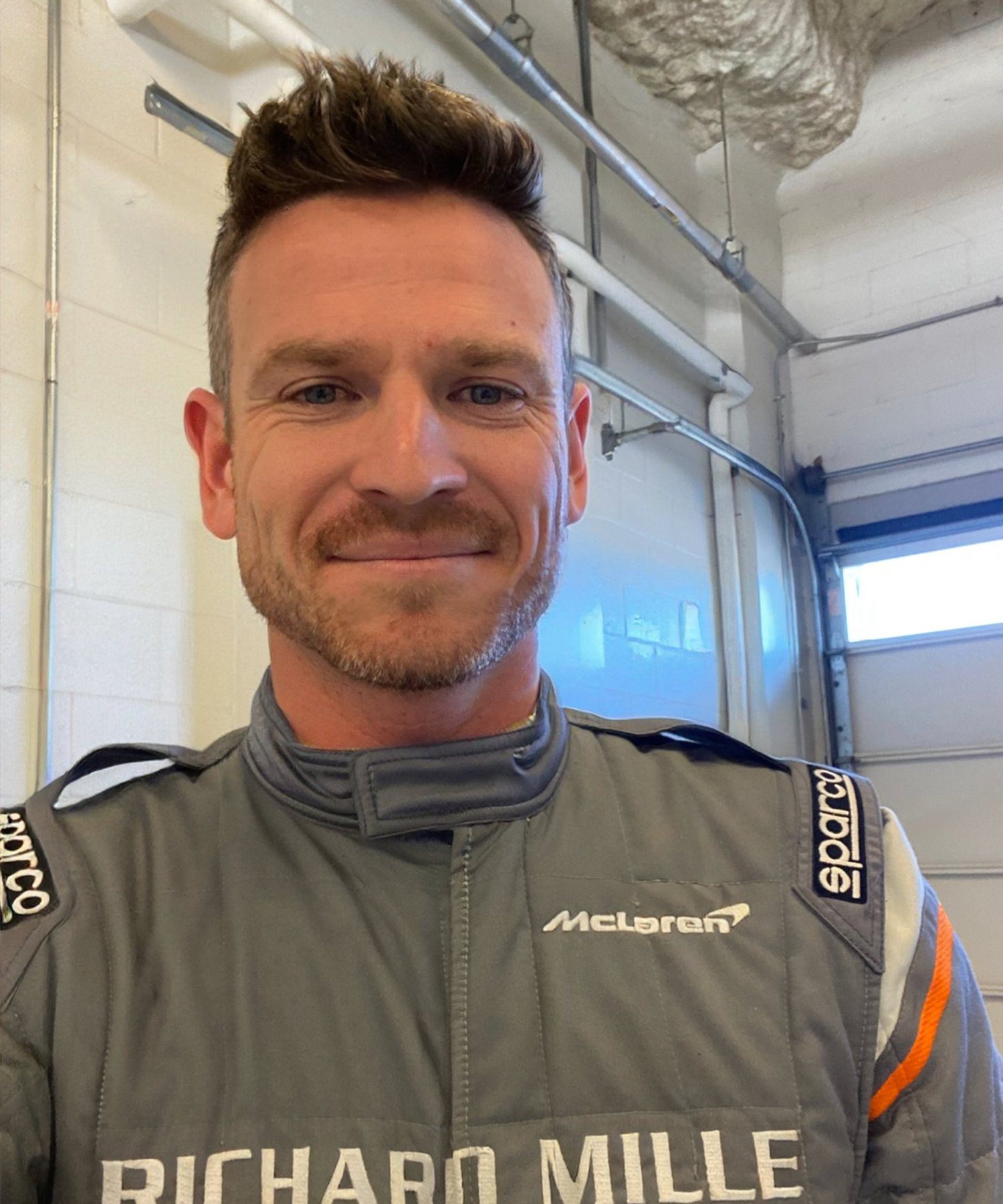 Alex Waters in McLaren race suit